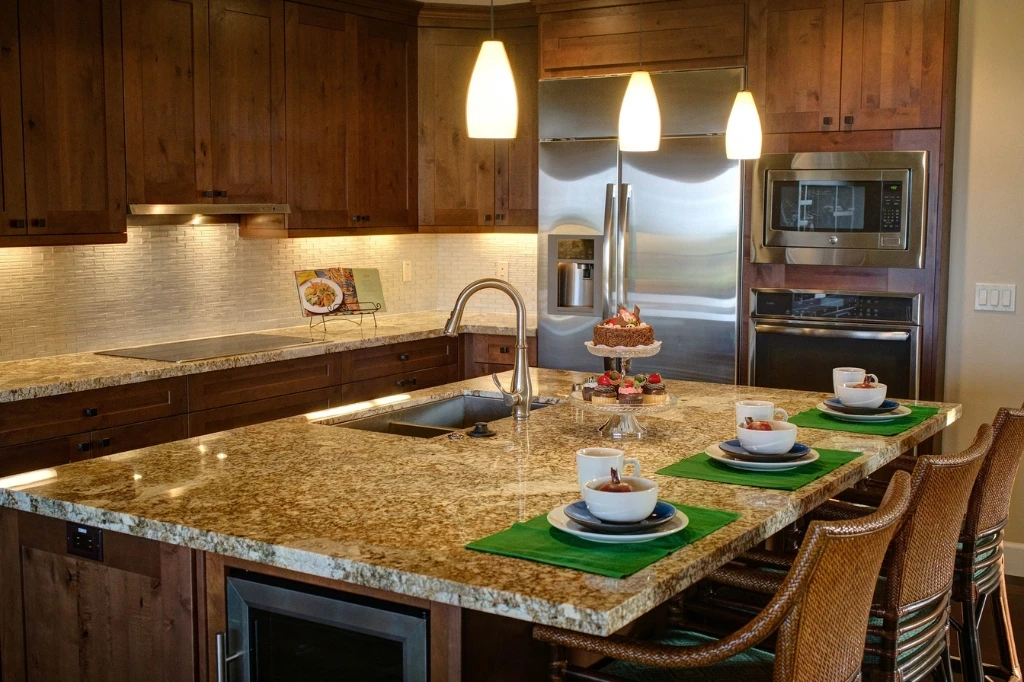 Modern kitchen trends for 2024 with granite counters and stainless steel appliances.