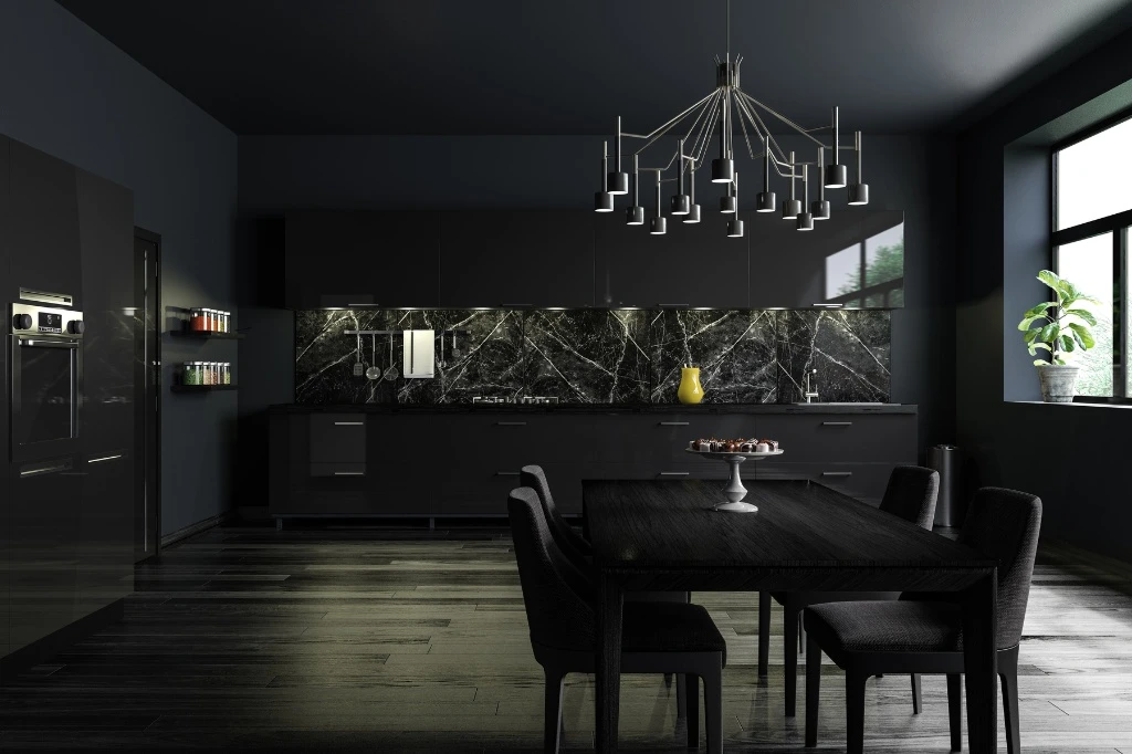 A black kitchen featuring a dining table and chairs, designed in an average size for comfortable dining and cooking.