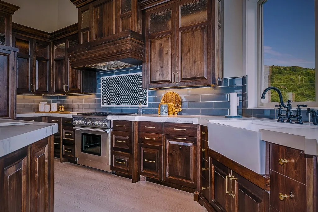 A modern kitchen featuring wooden cabinets and a sink, showcasing a stylish remodeling a kitchen design concept.