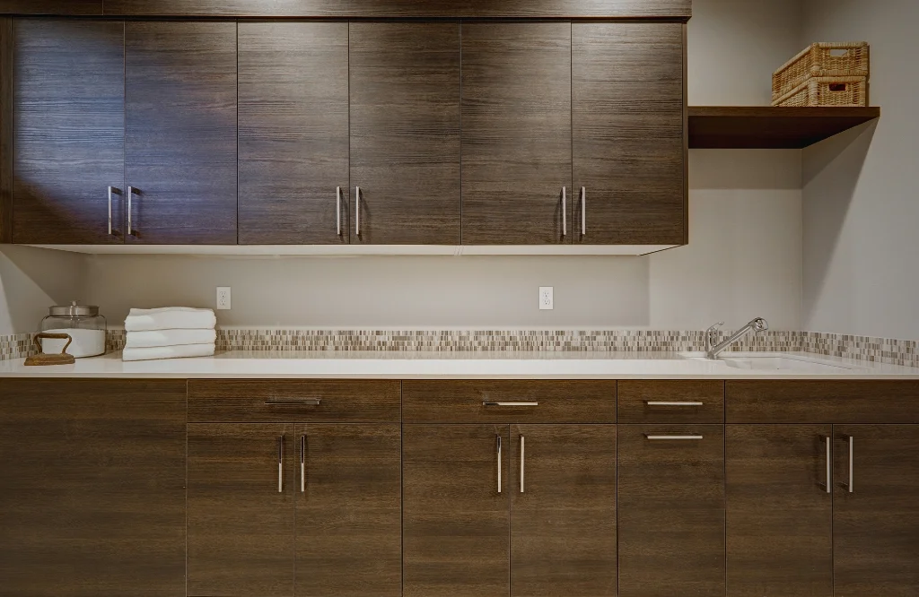 Modern kitchen design highlighting shaker cabinets and a polished sink, creating an elegant and practical cooking space.