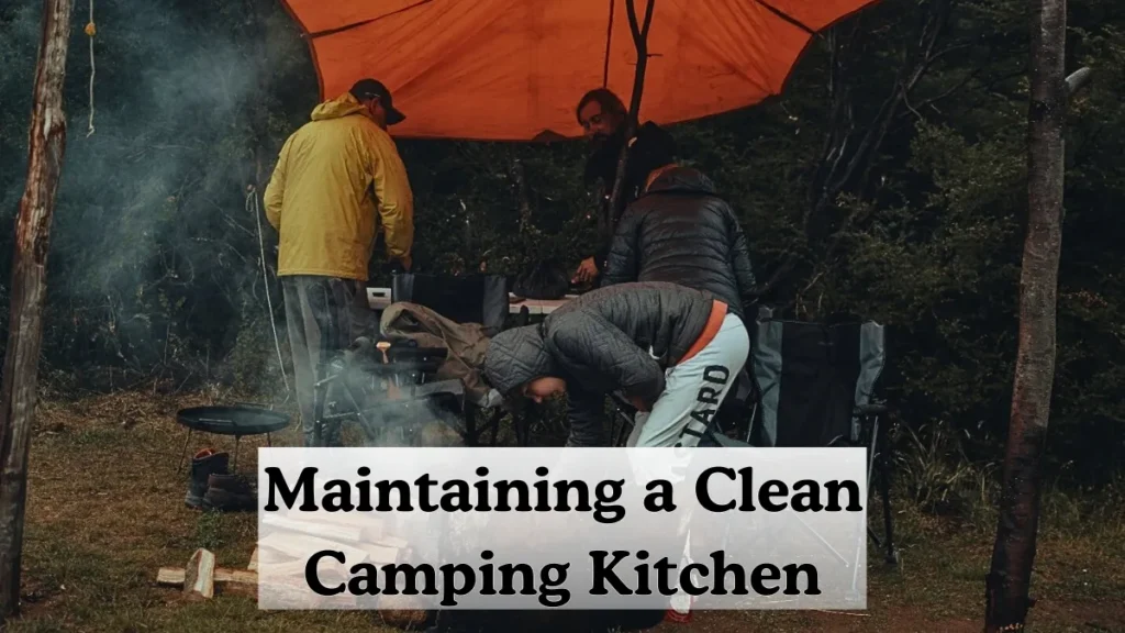 Three individuals are present under an orange camping tent in a forest, showcasing their efforts to make a clean kitchen area.