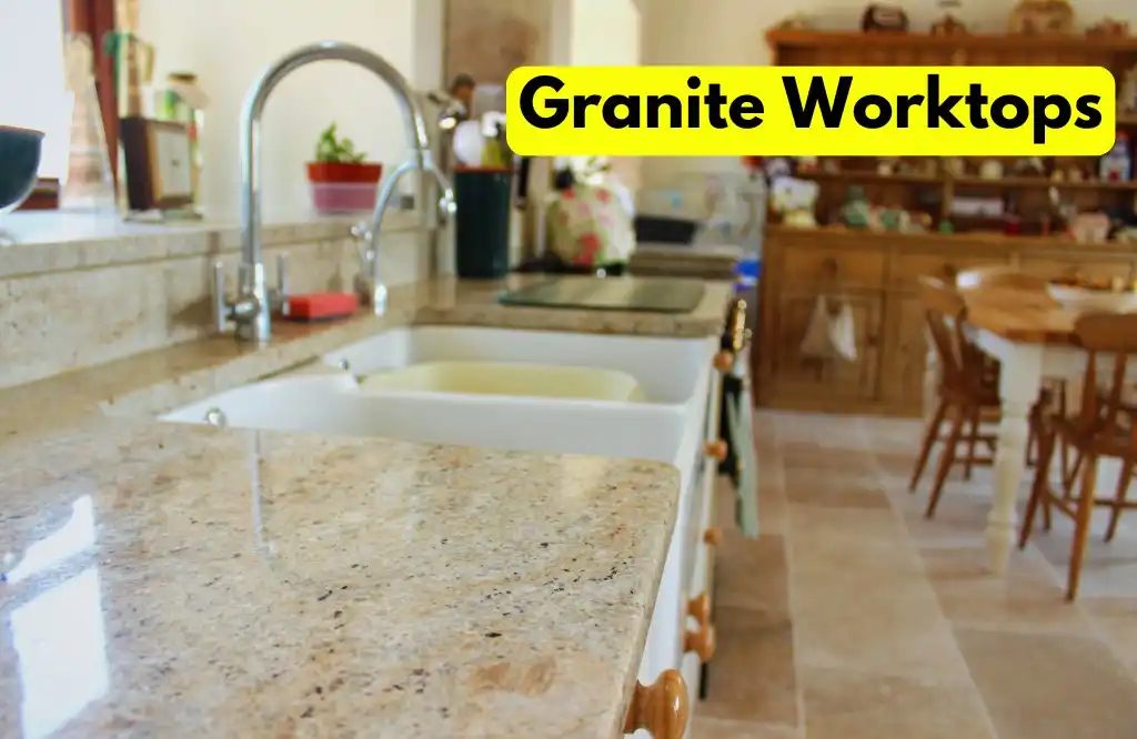 Granite worktops in a cozy outdoor kitchen, offering durability and a sleek finish, perfect for weather resistance.