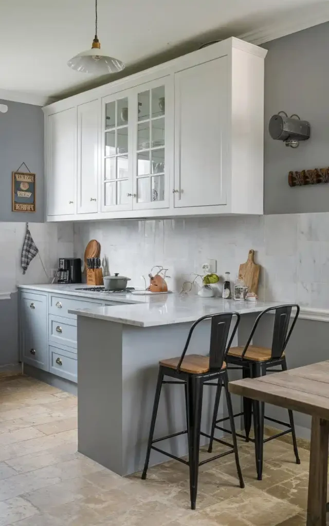 modern kitchen with grey and white cabinets and marble countertops