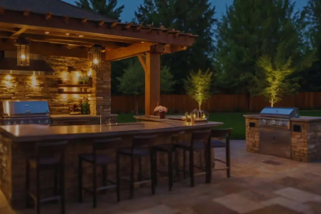 Elegant outdoor kitchen bar with stone walls and dim lighting