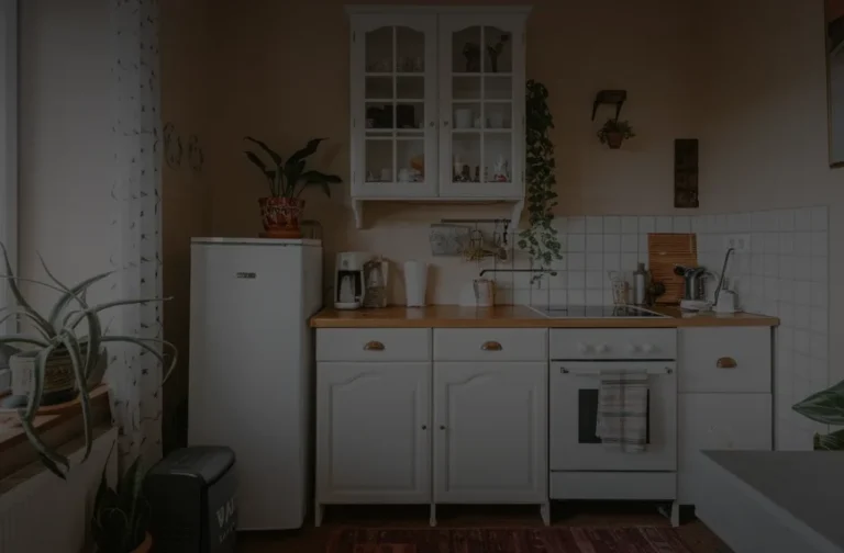 Charming small kitchen with a compact design, potted plants, and smart storage